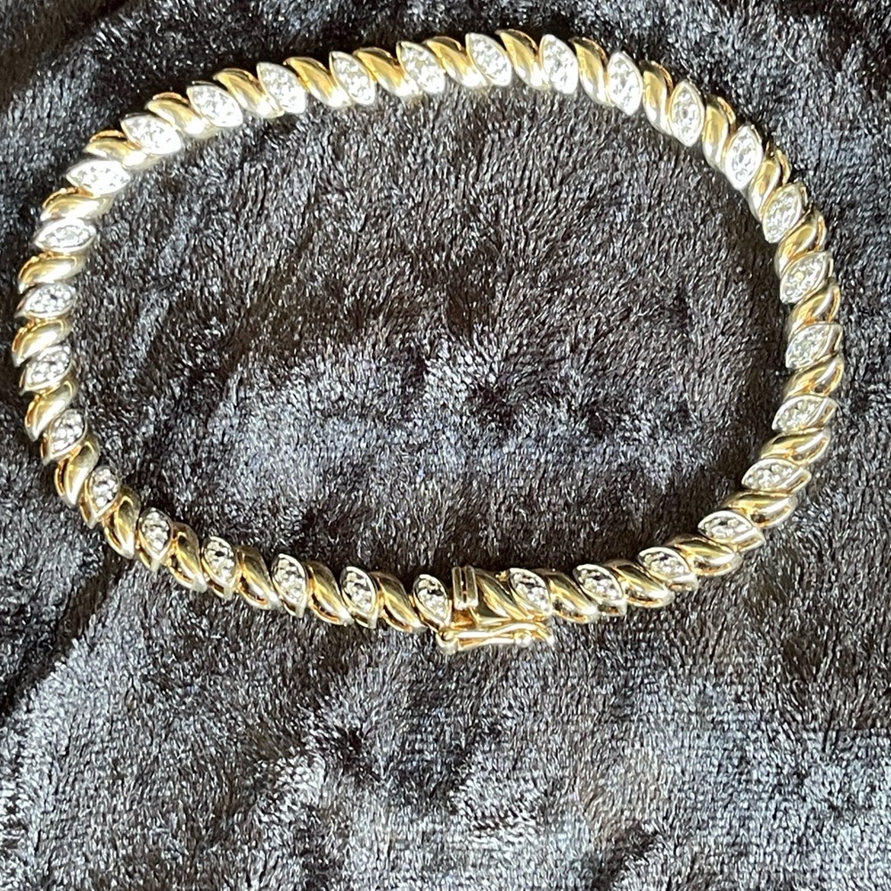 Elegant Gold and Silver Braided Bracelet
